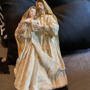 Elegant Gold and Cream Religious Figurine